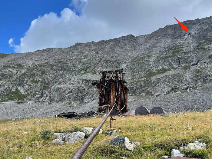 From the building, a long cable stretched more than halfway up the mountain, which I imagine was part of the mining process. As I followed the cable, I spotted an entrance to another mine.