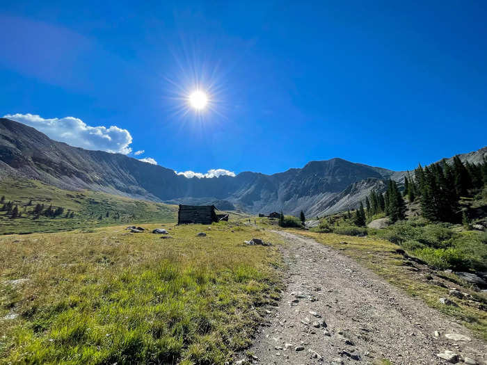 After hiking a little more than a mile, I reached the largest portion of the ghost town. In the vast expanse, I could spot three buildings at the base of the grand mountains.