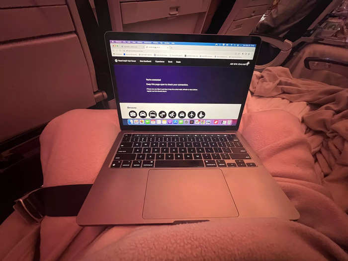 Once the bed was set up, I put my computer on my lap and leaned against the fuselage wall. The setup was comfortable, and I was able to tap into the free inflight WiFi.