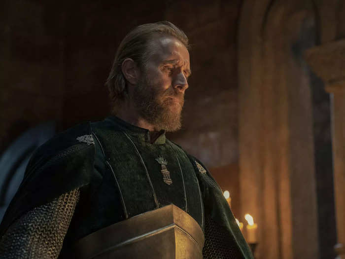 Rhys Ifans plays Ser Otto Hightower, the Hand of the King and father of Alicent.