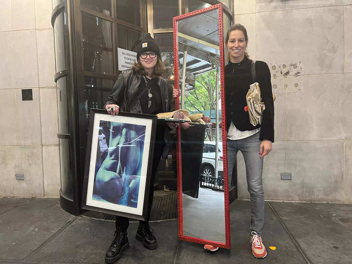 When I reached the front of the line, I saw a couple of shoppers leave the hotel with a piece of artwork and a red, studded mirror.