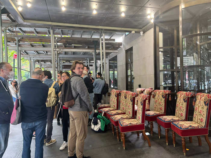 There was a throng of people waiting to go inside, and I had a feeling I was in for a good time when I saw a set of elegant chairs.