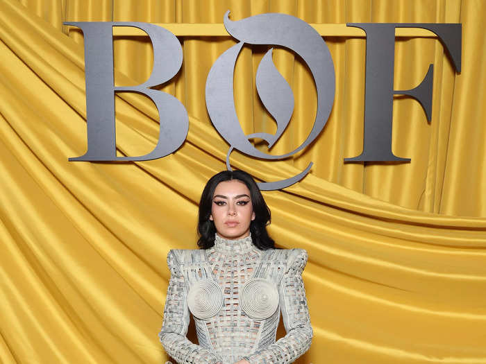 Meanwhile, Charli XCX attended Business of Fashion