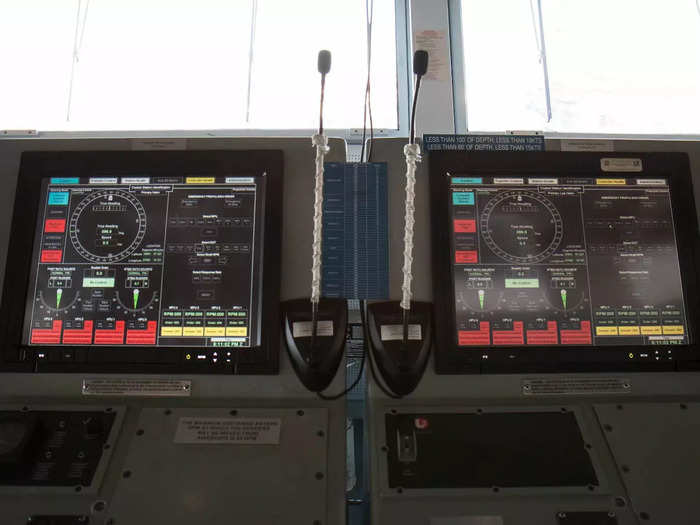 The lead helm digitally controls the speed and steering of the aircraft carrier.
