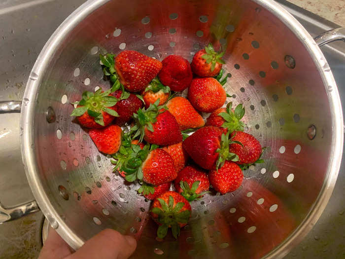 First, I washed the strawberries and sliced them
