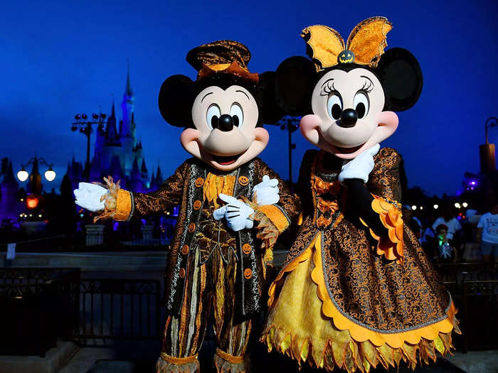 At Walt Disney World in Orlando, Florida, visitors can find Mickey and Minnie Mouse dressed in Halloween ensembles.