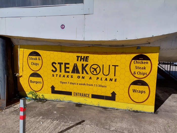 The restaurant is officially called The Steakout, but it also goes by the tagline "Steaks on a Plane." It describes itself as a "unique dining experience."