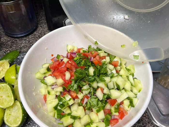 After you let the lime juice marinate in the shrimp for about ten minutes, add the chopped vegetables to the same bowl and mix thoroughly.