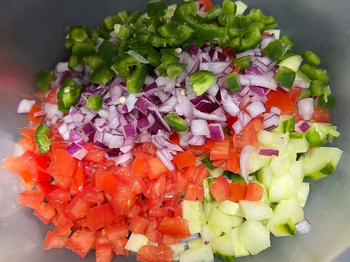 Next, I diced 1/4 of a large red onion, three roma tomatoes, half a bunch of cilantro, a jalapeño, and added everything to a bowl.