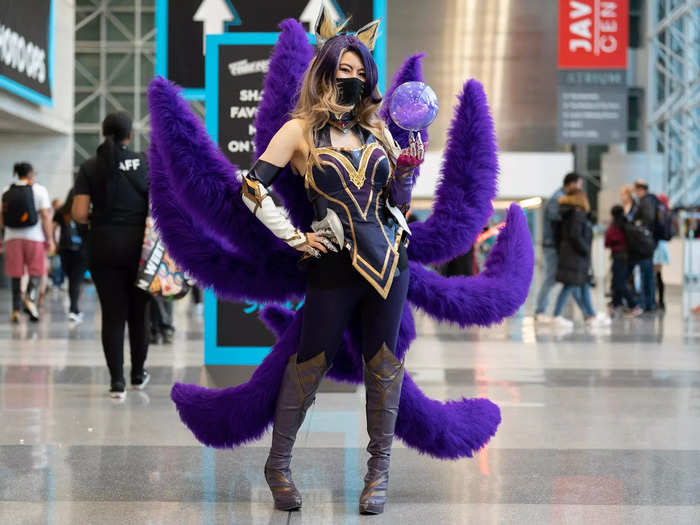 This NYCC attendee dazzled in a purple costume inspired by the "League of Legends" character Ahri.