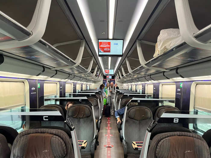 The long, air-conditioned train carriages were spacious, and most seats had a table. I liked how the seats were separated by screens, but I wasn