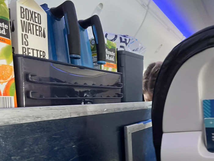 Soon after takeoff, the flight attendants came through the cabin to serve drinks and snacks.