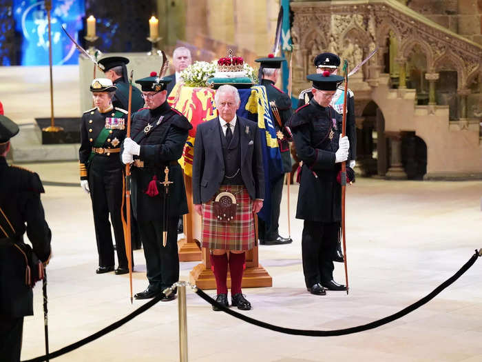 Charles and his siblings then stood guard around the Queen