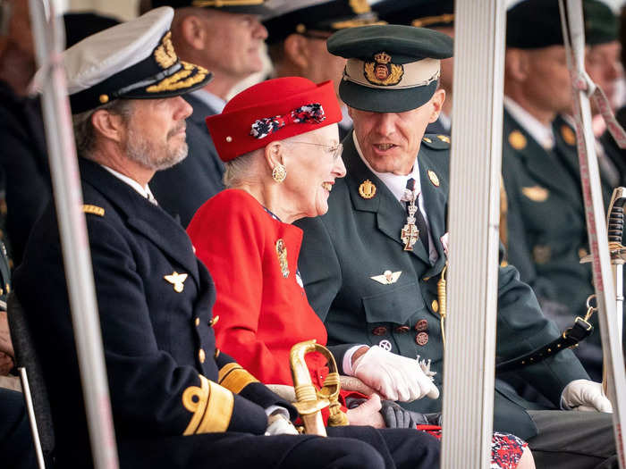 Queen Margrethe celebrated her Golden Jubilee in September 2022, marking 50 years on the throne. She sat between Prince Frederik and Prince Joachim during the Danish Army