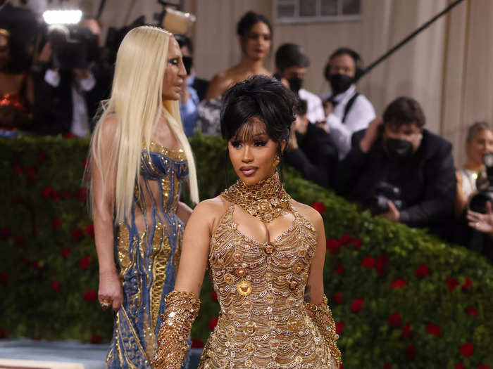 In one of her most glamorous looks to date, Cardi B attended the 2022 Met Gala in a gold chain-mail dress.