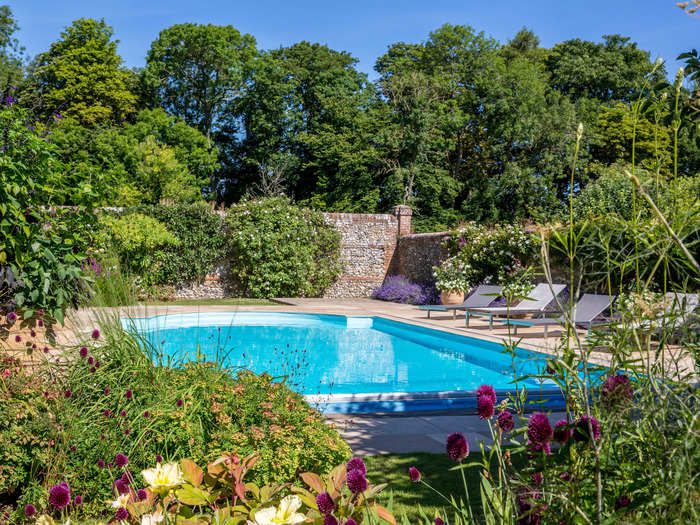 The property comes with an outdoor heated swimming pool.