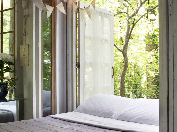 The treehouse was featured by the home décor company Parachute and is now outfitted with Parachute linens.