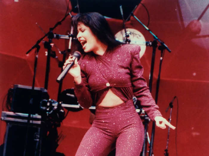 Mexican American singer Selena Quintanilla-Pérez, often called the "Queen of Tejano music," wore a stunning red jumpsuit for a performance in 1995.