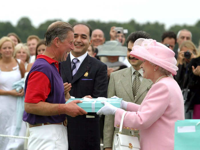 Shutterstock royal photographer Tim Rooke took this snapshot of the Queen and King Charles (then Prince of Wales) at a polo game in 2003.