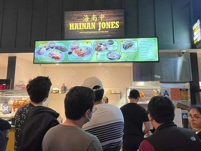 At Hainan Jones, the stall serving chicken rice, customers were lined up and ready to dish out their $17.