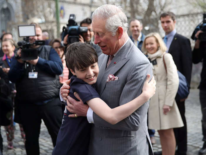 Charles broke royal protocol when he hugged an 11-year-old boy during a royal visit to Romania.