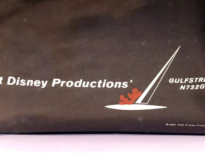 Passengers flying aboard The Mouse were given a flight bag with a silhouette image of Mickey lounging on the tail of the Gulfstream.