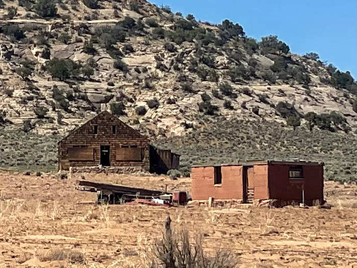 A cross in the door frame of a ghost town in Utah was an unsettling reminder of its unusual past.