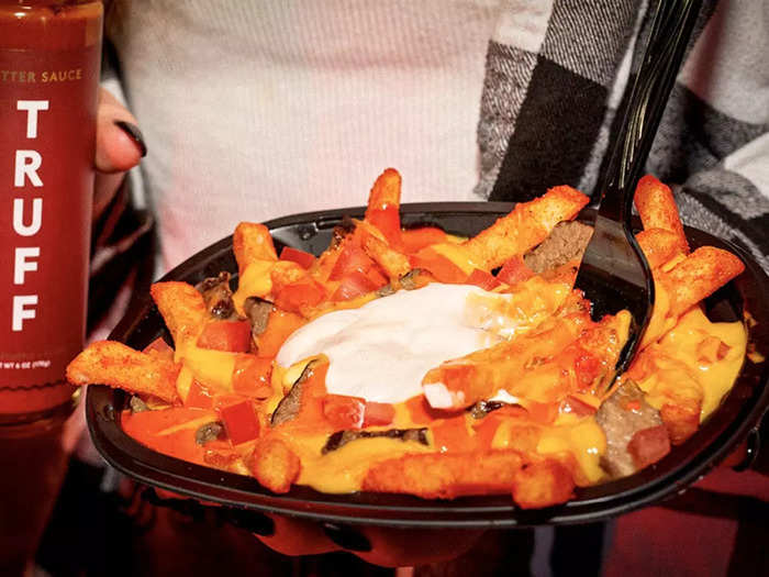 The Loaded TRUFF Nacho Fries come packed with plenty of ingredients ...