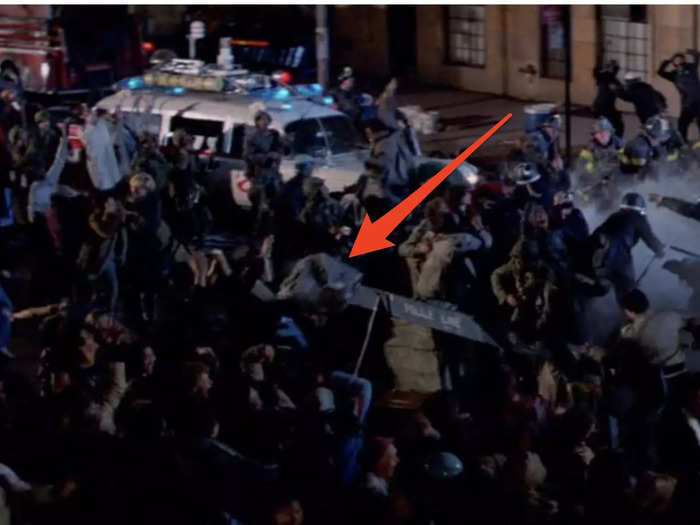 A boulder bounces off of a police barricade instead of crushing it.