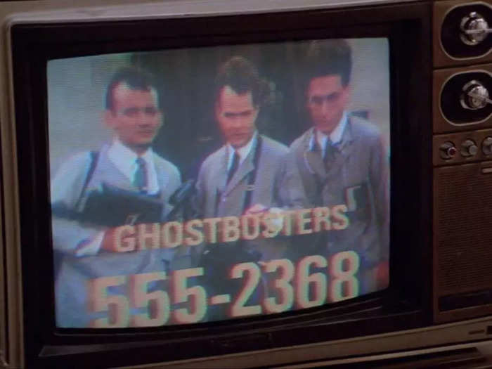 The fake number in the Ghostbusters commercial has appeared in other movies.