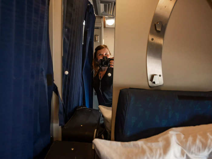 The roomette had a mirror, a closet, and a bit of additional storage space.