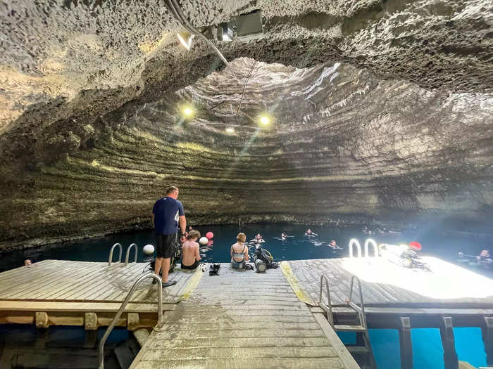 The once-empty pool was now filled with visitors. A group was working toward their dive certification, while families donned snorkel gear and life jackets.