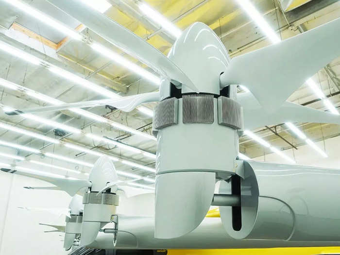 The rotating front propellers tilt to shift from lift to thrust.