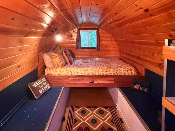 Inside the chuck wagon were my ultra-cozy sleeping quarters: a 6-inch spring mattress on a wooden platform with light yellow cowgirl-themed bedding.