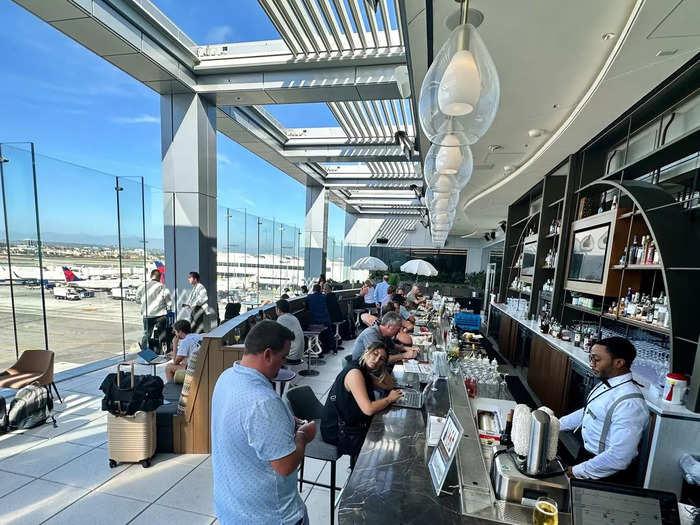 The highlight of the new LAX club is the Sky Deck all-weather outdoor terrace that offers complimentary cocktails and panoramic views of the flight line with downtown LA and the Hollywood Hills in the distance.