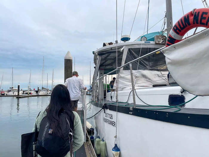 I walked to the pier in Cairns where the Rum Runner was moored. Slowly, a stream of 12 other people arrived. Together, the group of strangers chatted on the boat