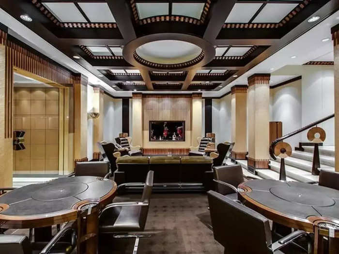 A custom cigar lounge also features card tables.