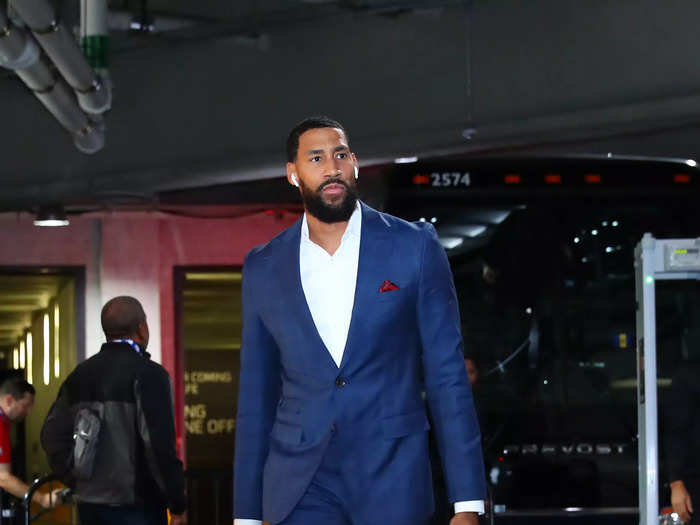 Garrett Temple looks smart in a well-fitted blue suit.