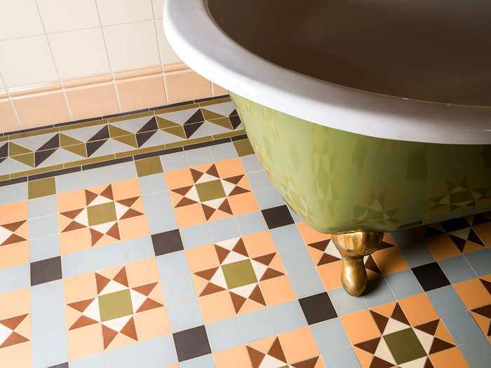 Brighten up your bathroom with colored tile and concrete.