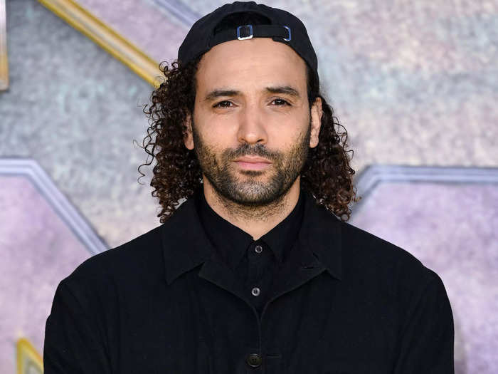 Kenzari currently has longer hair than his "Black Adam" character.