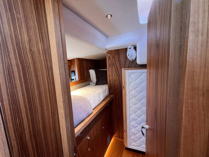 The sailing yacht has four cabins, including one optional area for crew. This tiny room was located in the middle of the yacht, next to the communication system and stairs up to the main deck.