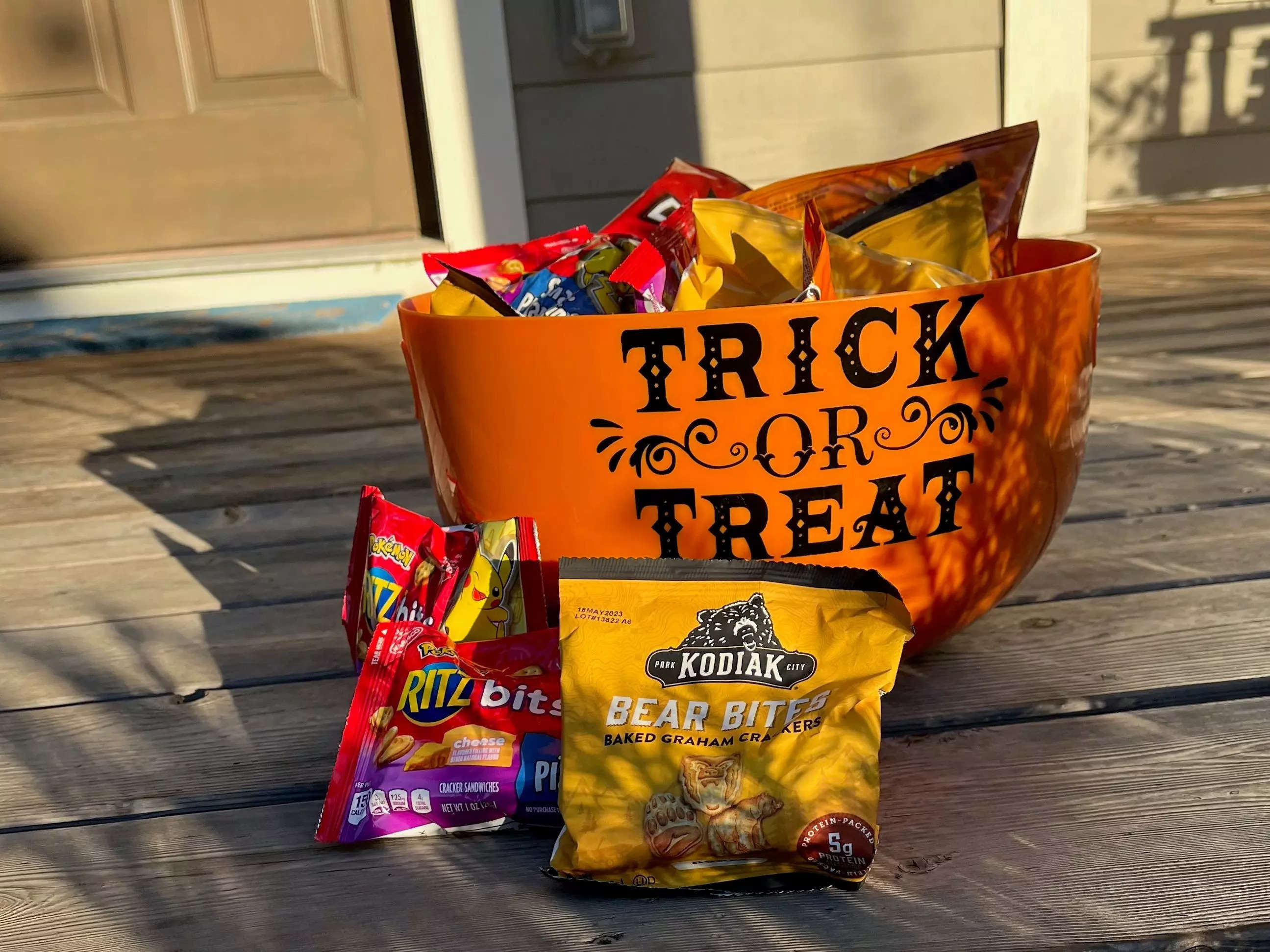 bags of chips on a trick or treat candy bowl