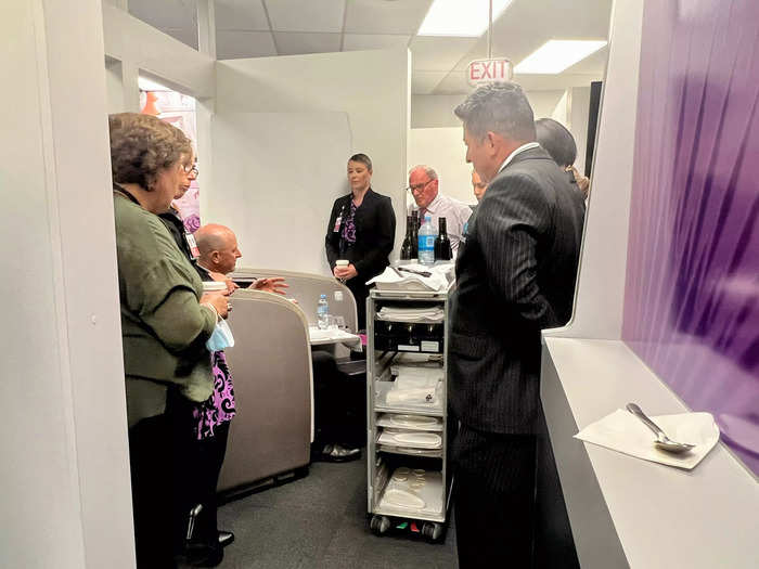 During our visit, we saw veteran flight attendants in the business class mockup learning about new wine offerings onboard so they can explain to customers.