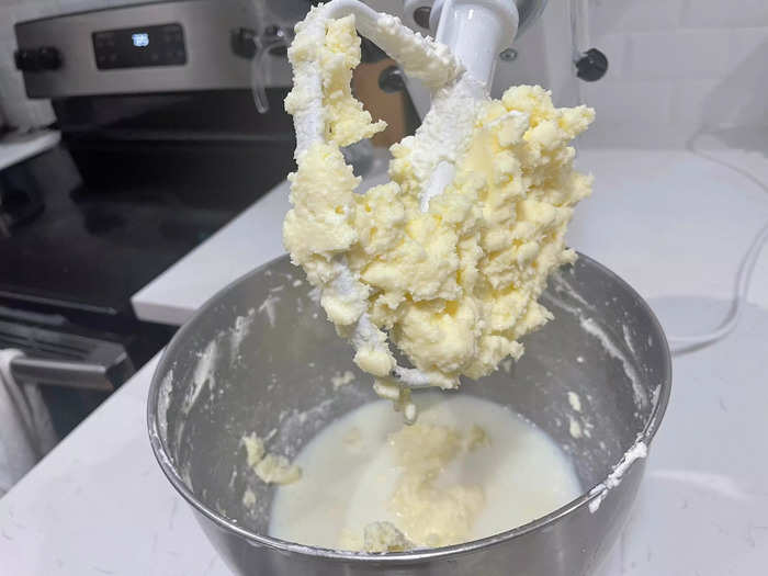 Stop the stand mixer once the solid butter consolidates.