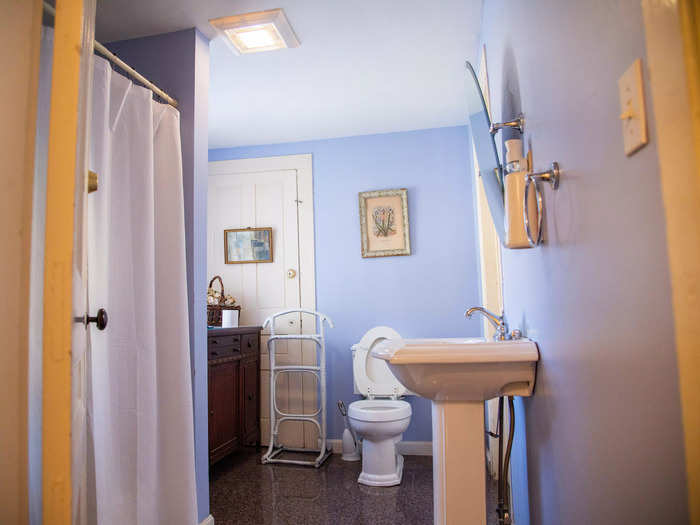 The house has four bathrooms in total. On the second floor, connected to the yellow bedroom and the hallway, is the largest bathroom on the premises.