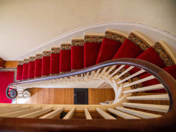 The long, curved staircase gave the house a regal feeling.