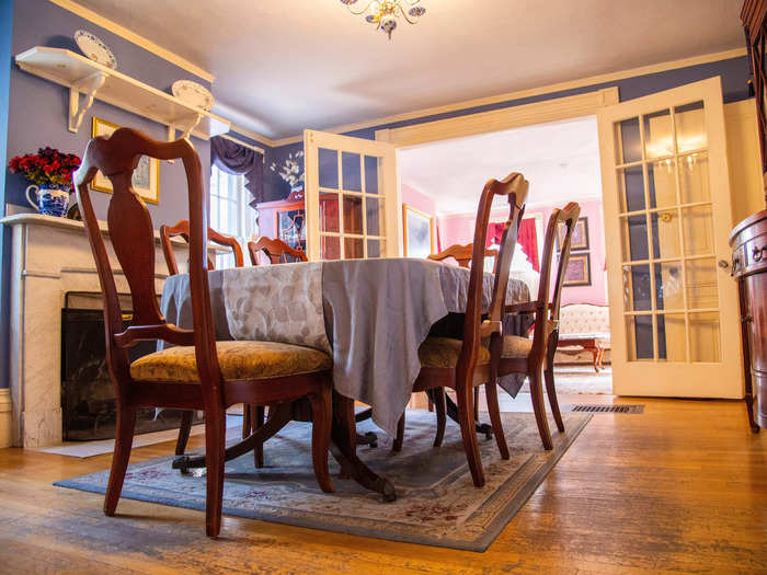 The dining room table offers seating for six guests.