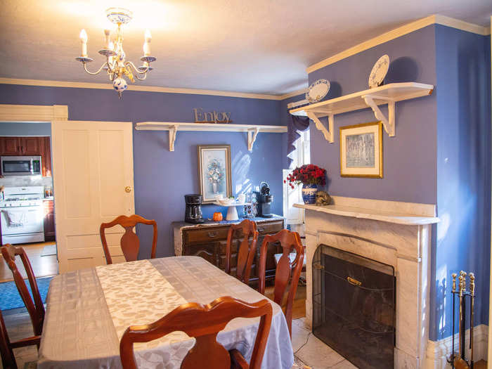 After walking through the French doors in the living room, I entered the bright blue dining room.