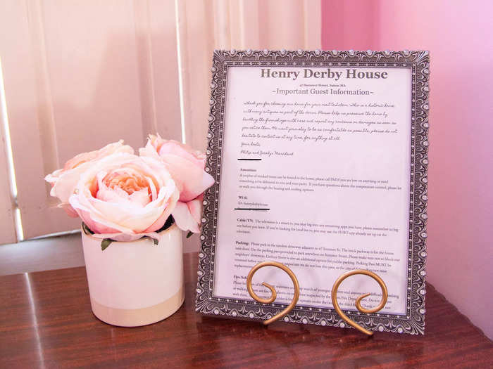 On top of the desk was a framed piece of paper with important information for guests, including where guests should park, the password to the WiFi, and information on the amenities offered.