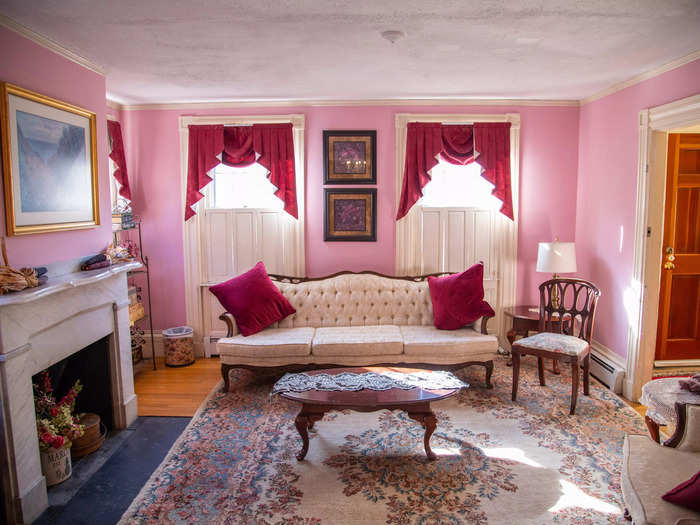 To the right of the entrance was the doorway leading to the living room. I was taken off guard by the bright pink walls.